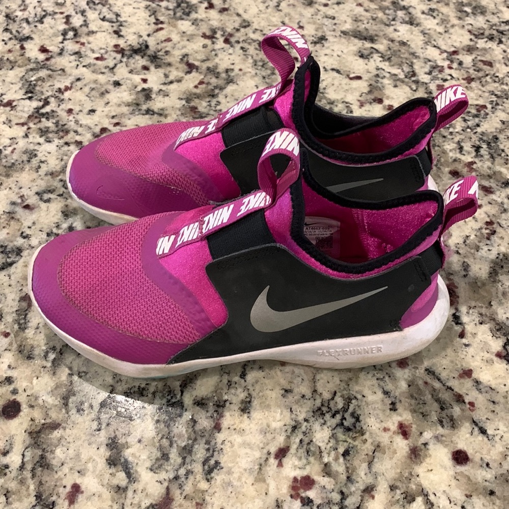 Size 3.5 Nike shoes.